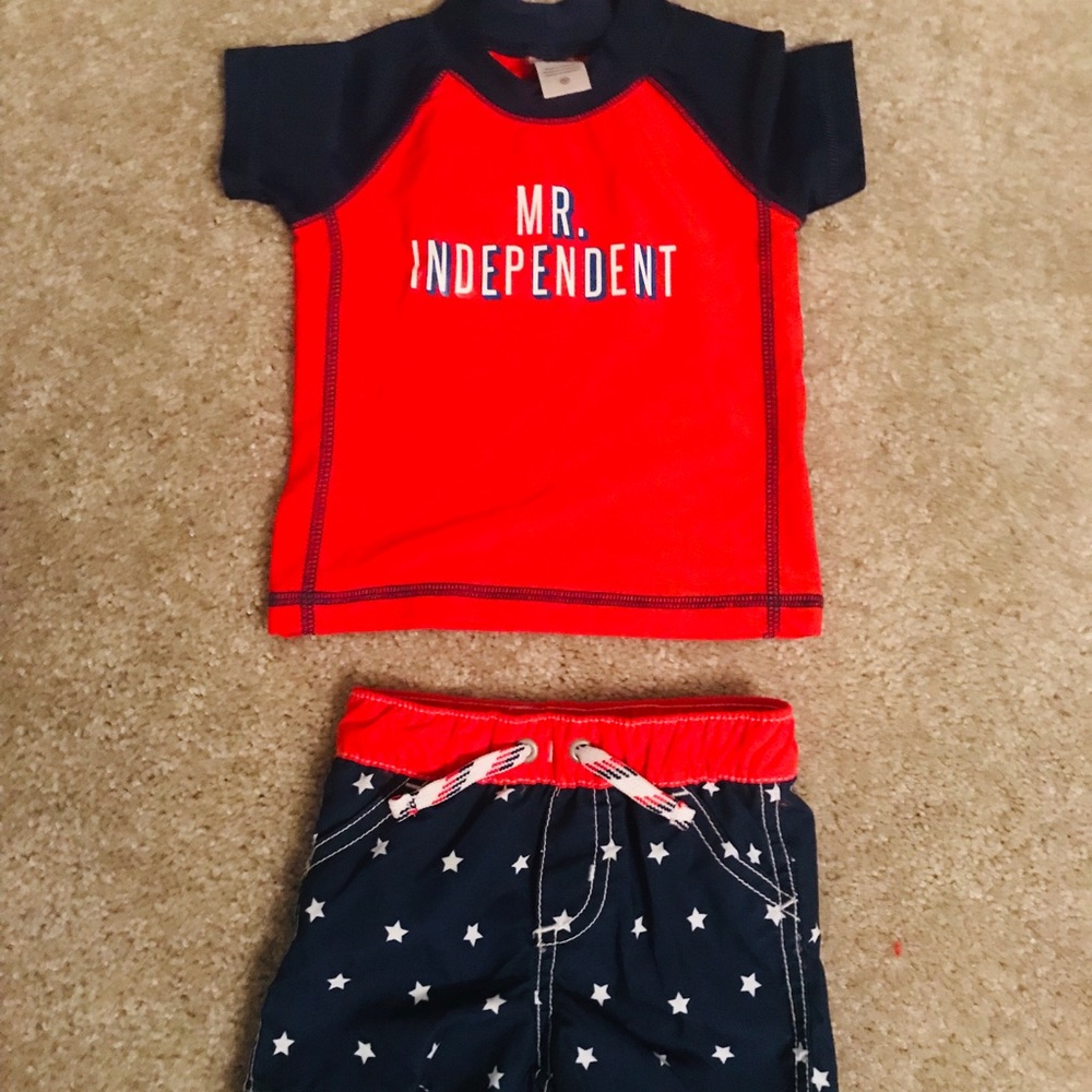 Carter’s infant swimming trunks and rash guard